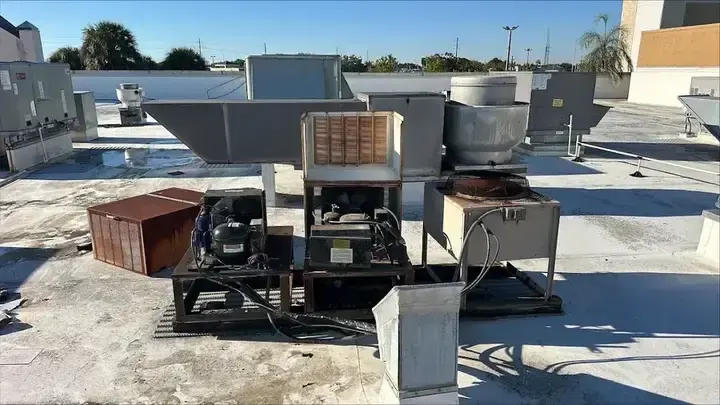 Open equipment housings provide access to compressors, tubing and wiring.